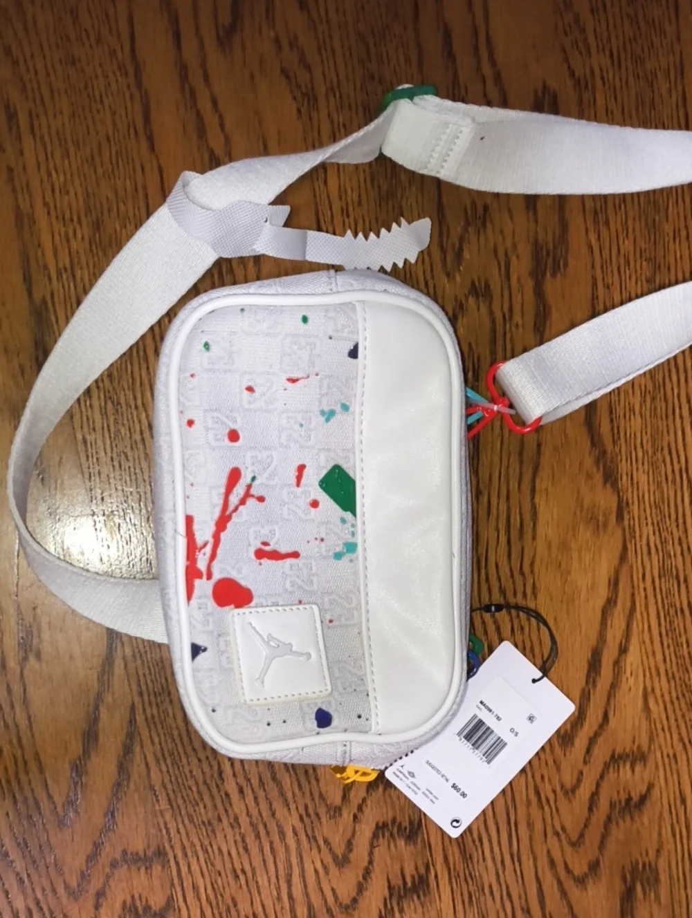 Jordan White Crossbody Bag with Red and Green Paint-Splash Accents